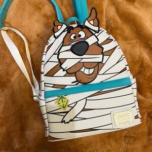 Loungefly Scooby-Doo Mummy Backpack with Turquoise and White (Glow in the dark)